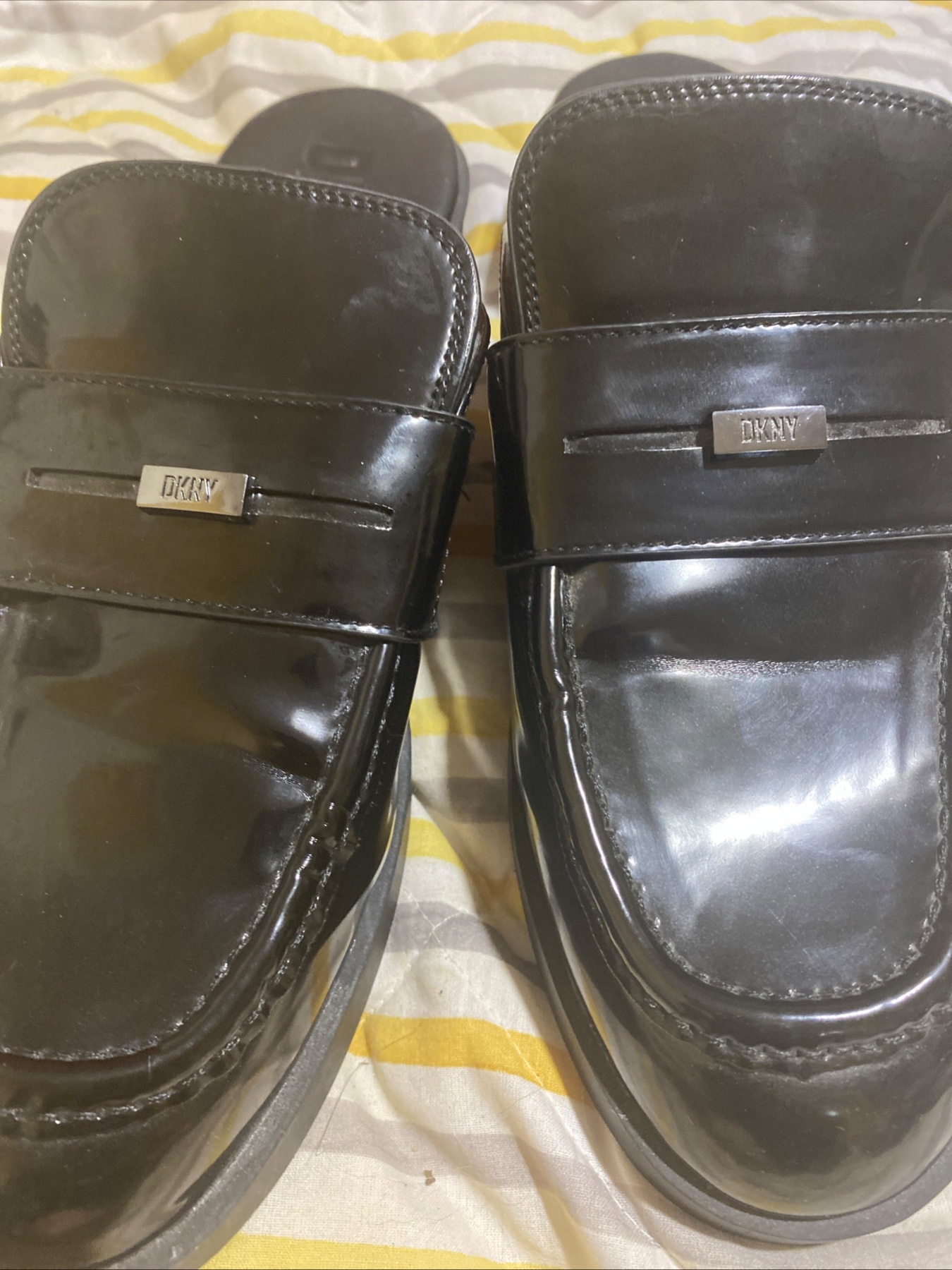DKNY black patent leather loafers
