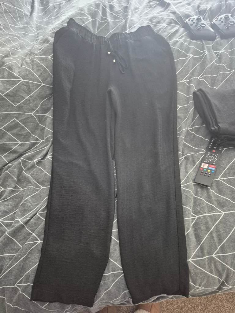 Black lightweight loose flare trousers