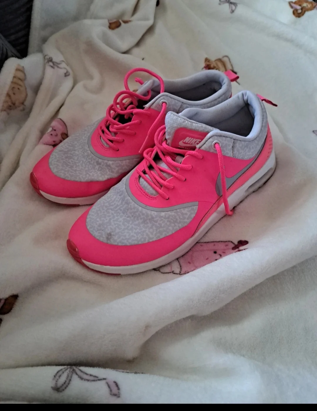 Pink and grey Nike trainers