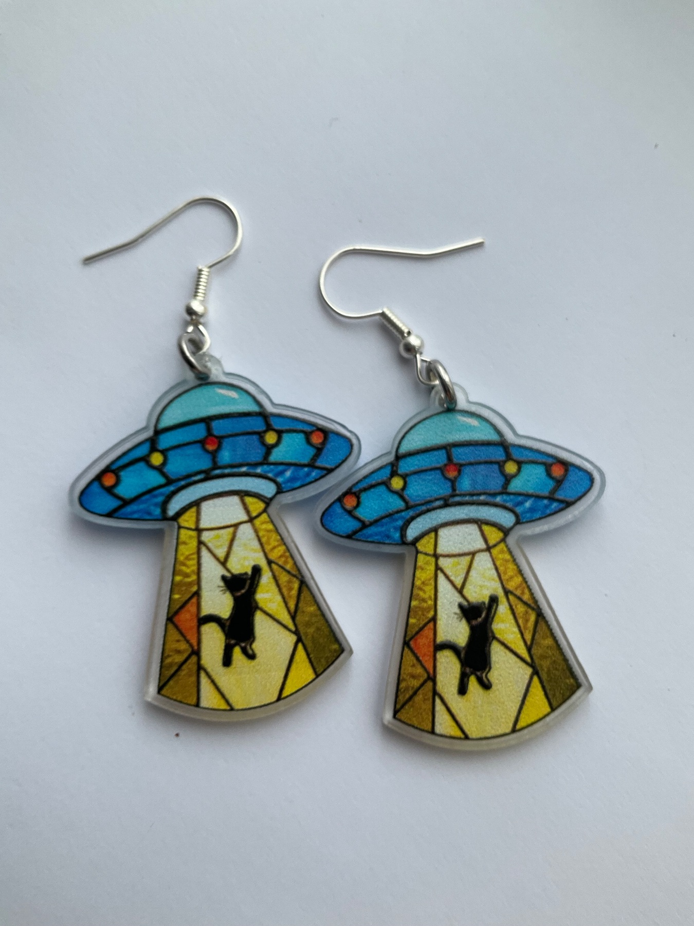 Quirky cat spaceship acrylic earrings