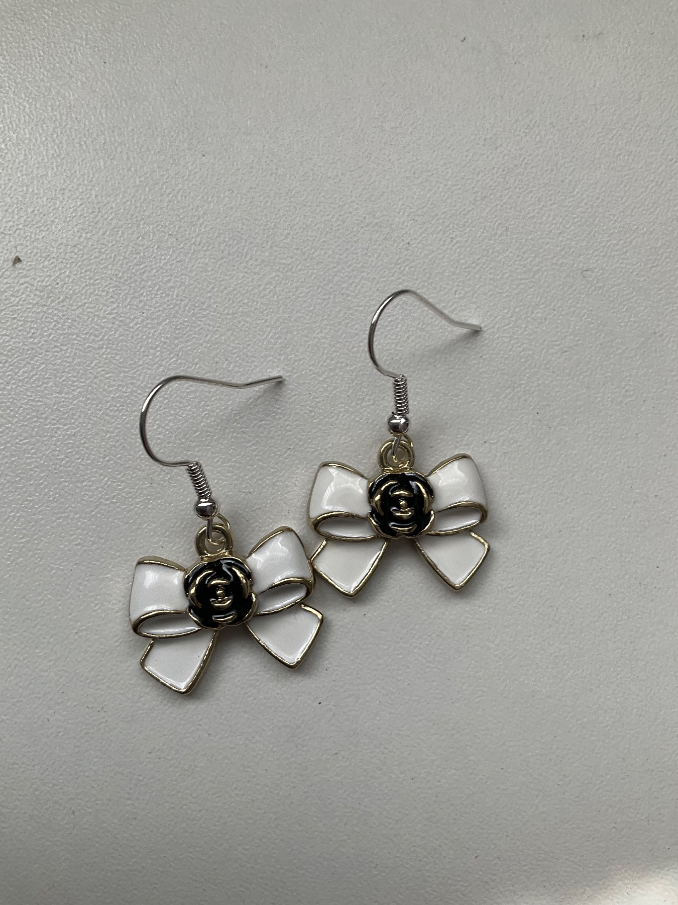 Metal cream and black bow earrings weddings christening party's