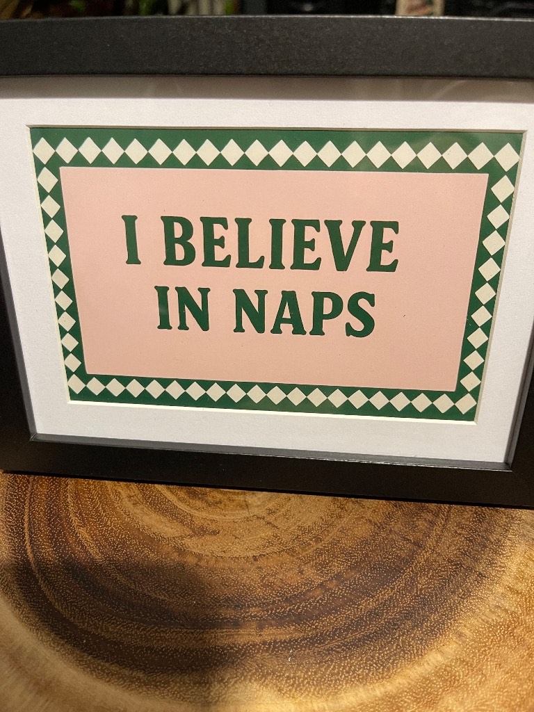 I believe in naps. Picture and frame.