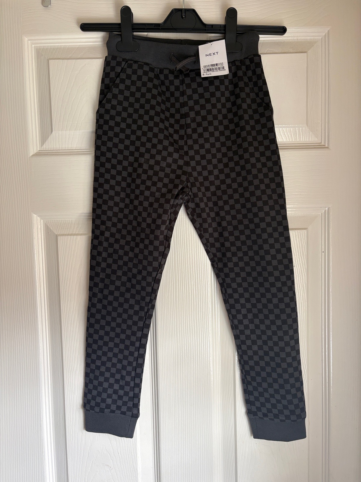 Boys checked leggings / trousers
