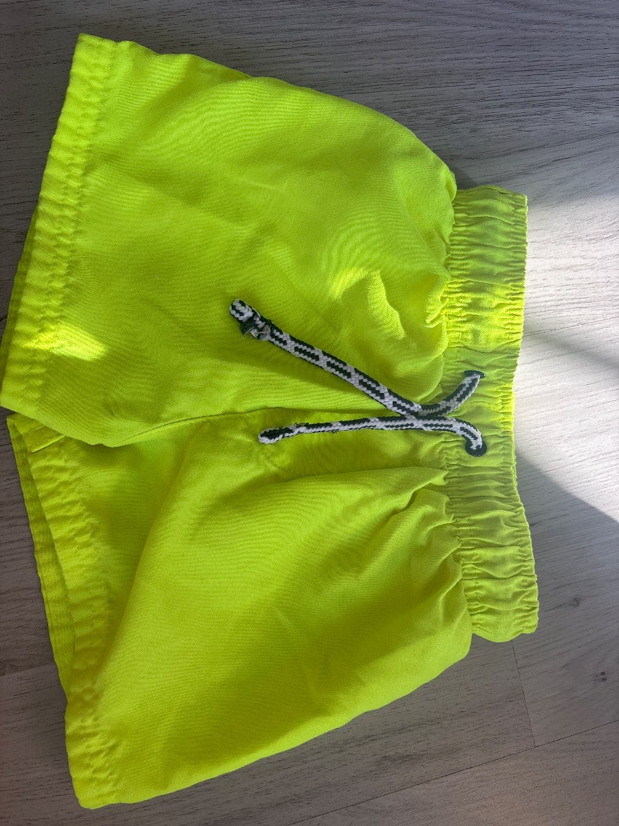 Neon yellow swim shorts