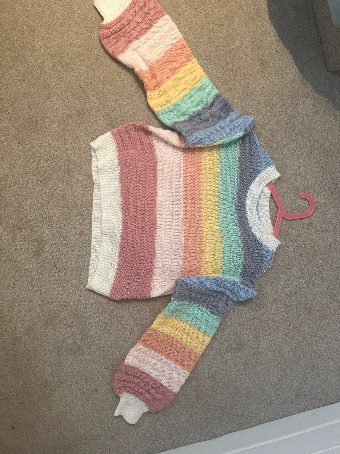 Pastel rainbow striped jumper.