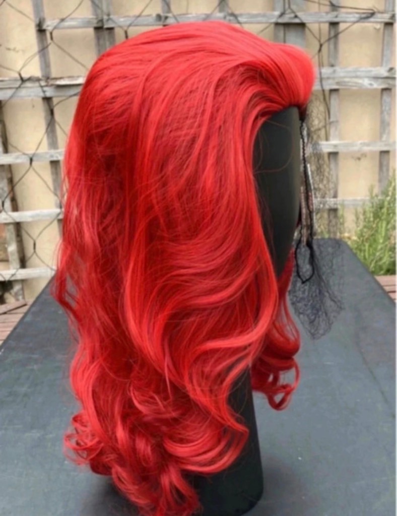 Wig. New Poppy red. New With Tags. Long Wavy 3/4 Hairpiece