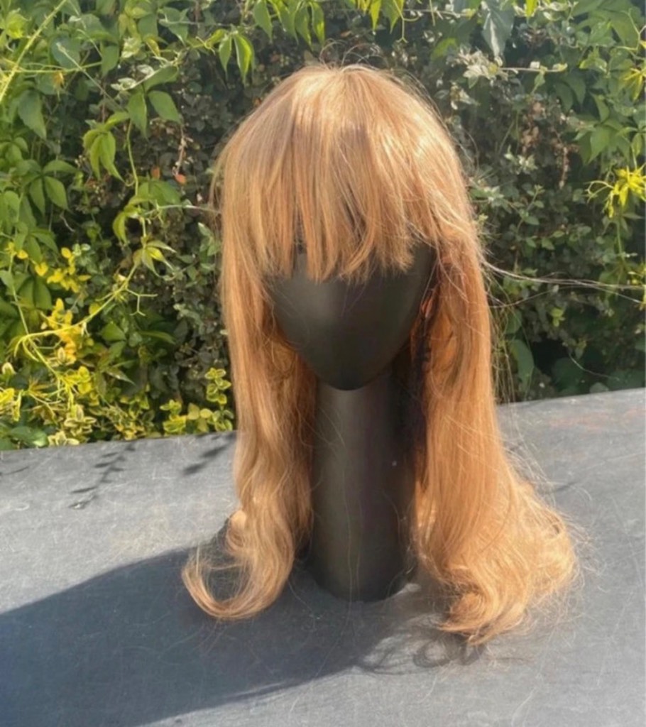 Wig. Dark blonde long synthetic wig. New with tags.