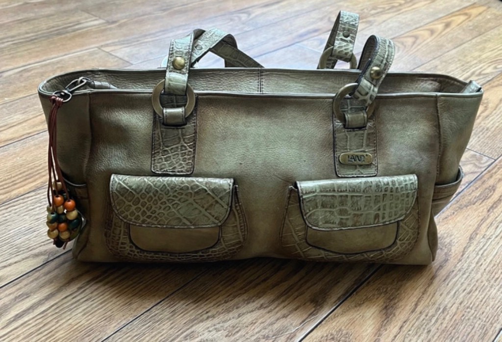 Land gold leather shoulder bag