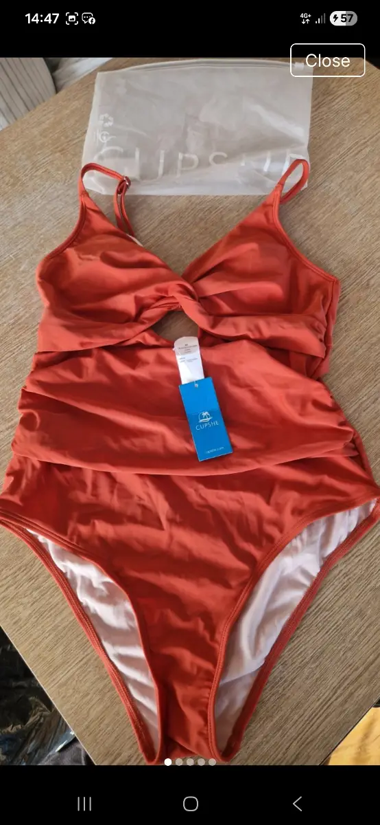 orange swimming costume