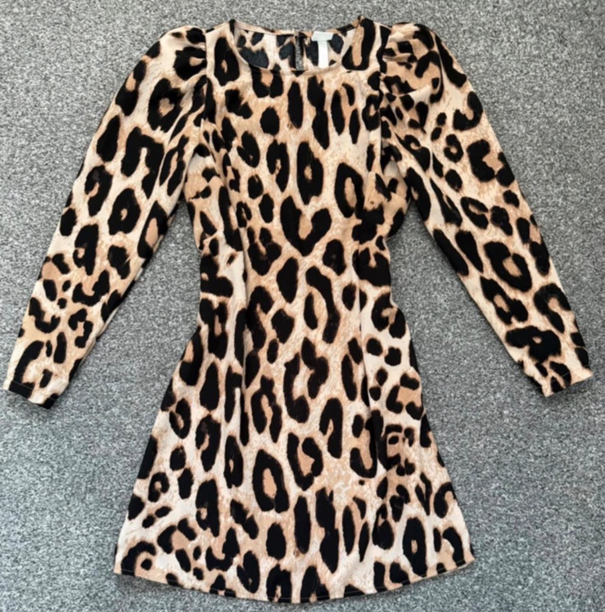 Leopard print dress from H&M with puff sleeves in a size small.