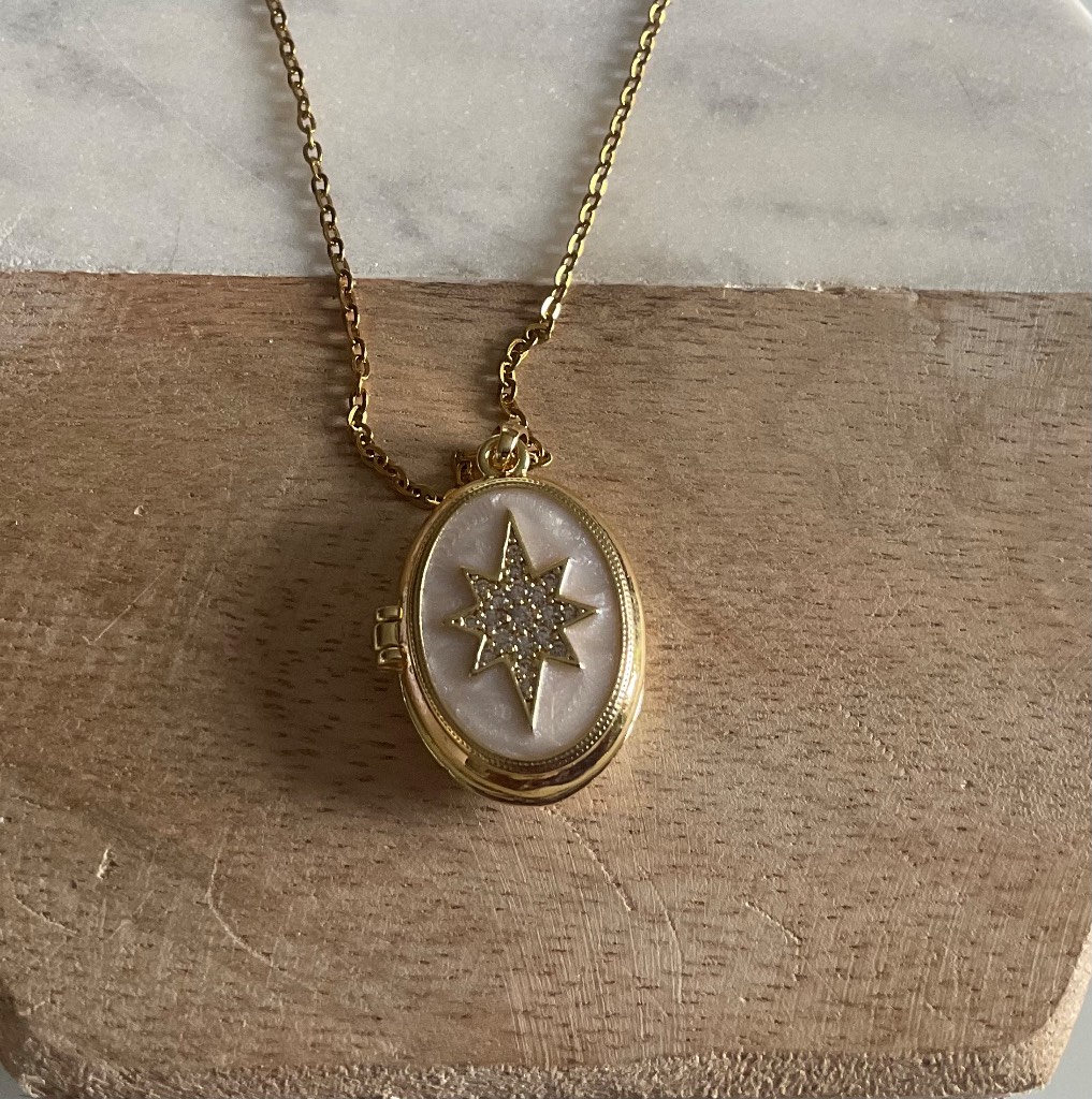 Lovely Mother of Pearl Faced Locket with a Crystal Star