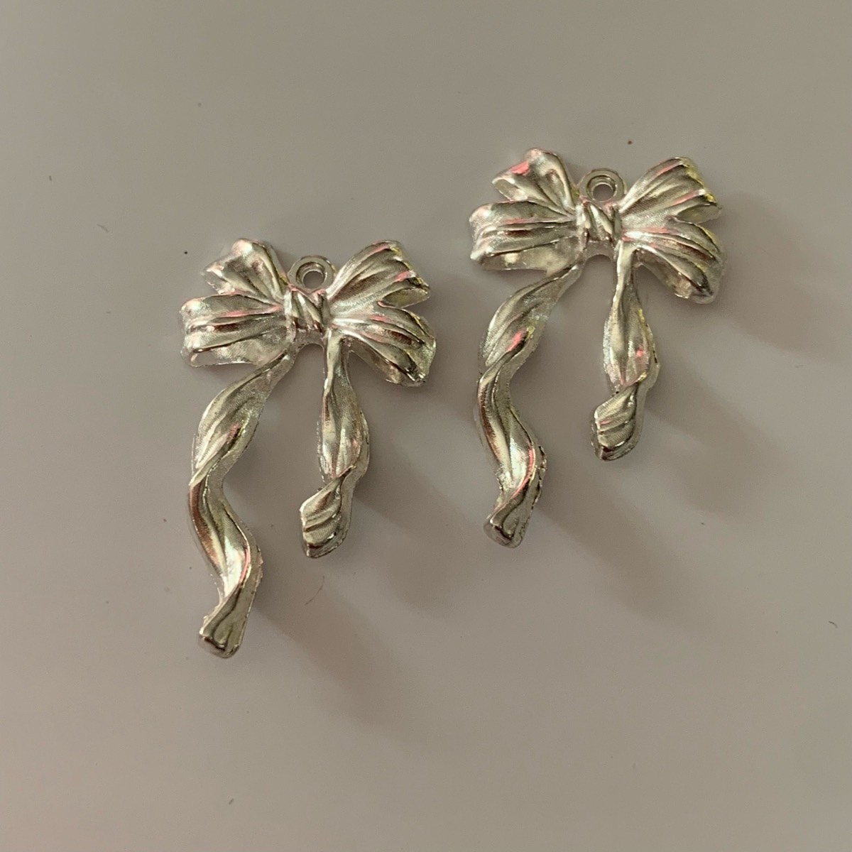 2 silver bow charms pendants for jewellery making crafting