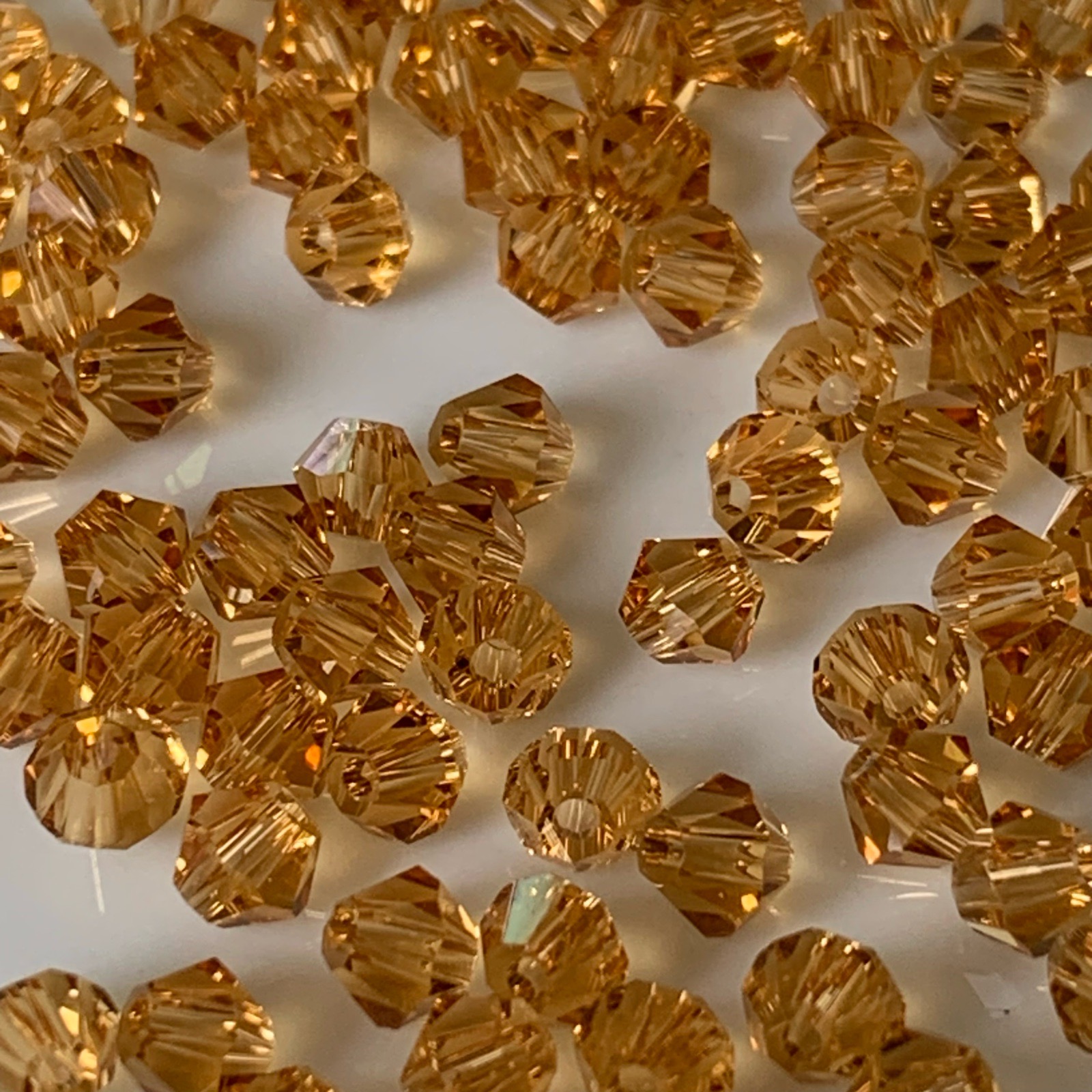 100 - 4mm Gold crystal glass bicone beads