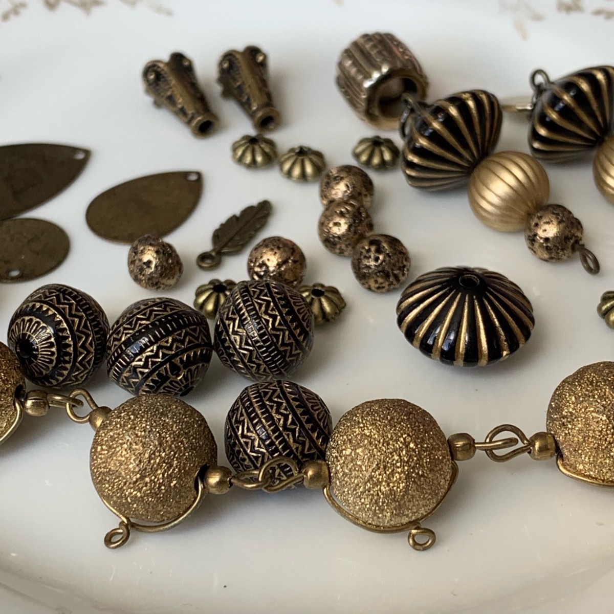 Selection of reclaimed gold beads for jewellery making crafting