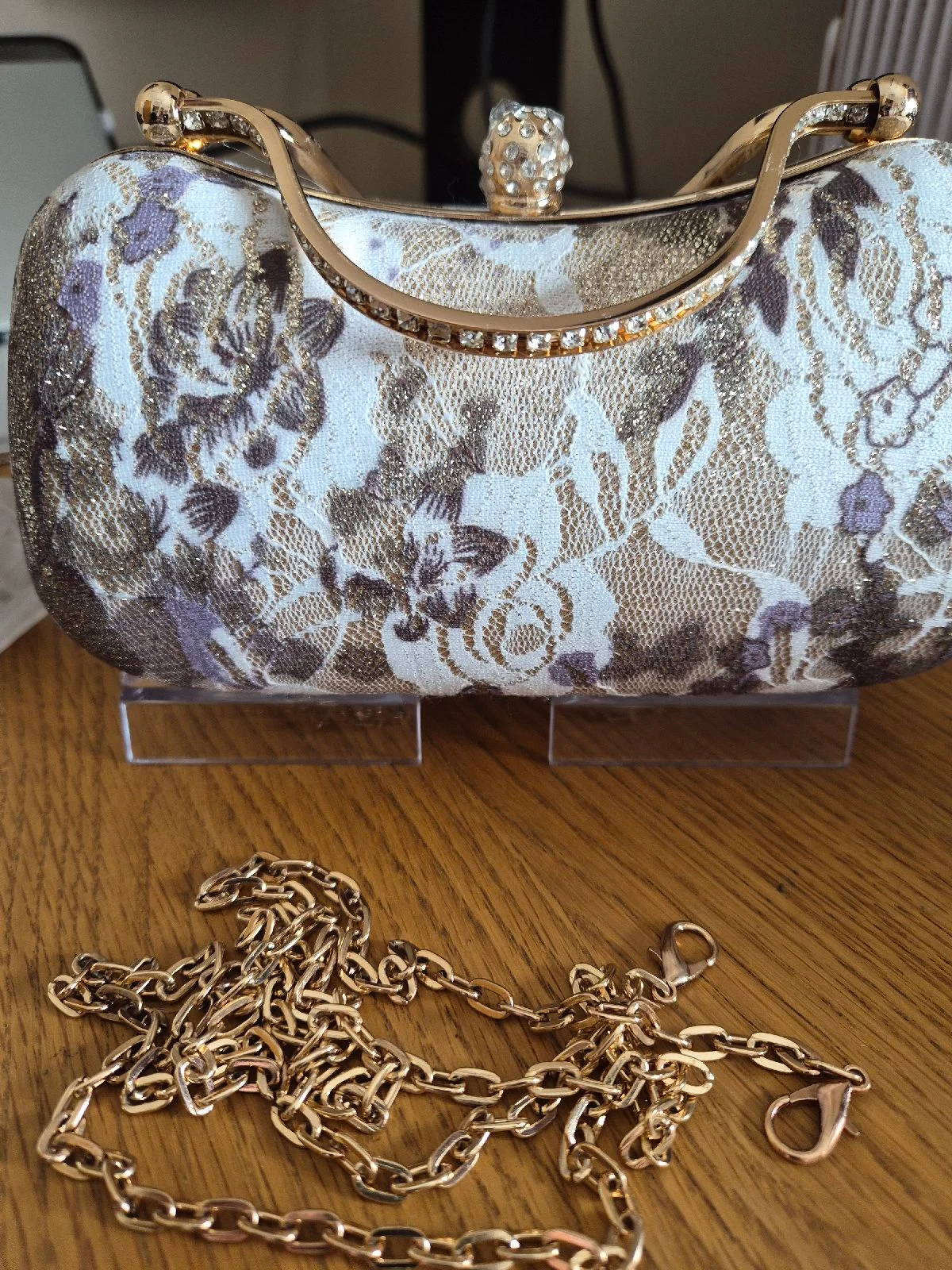 Ladies clutch bag size is 8 x 4 inches