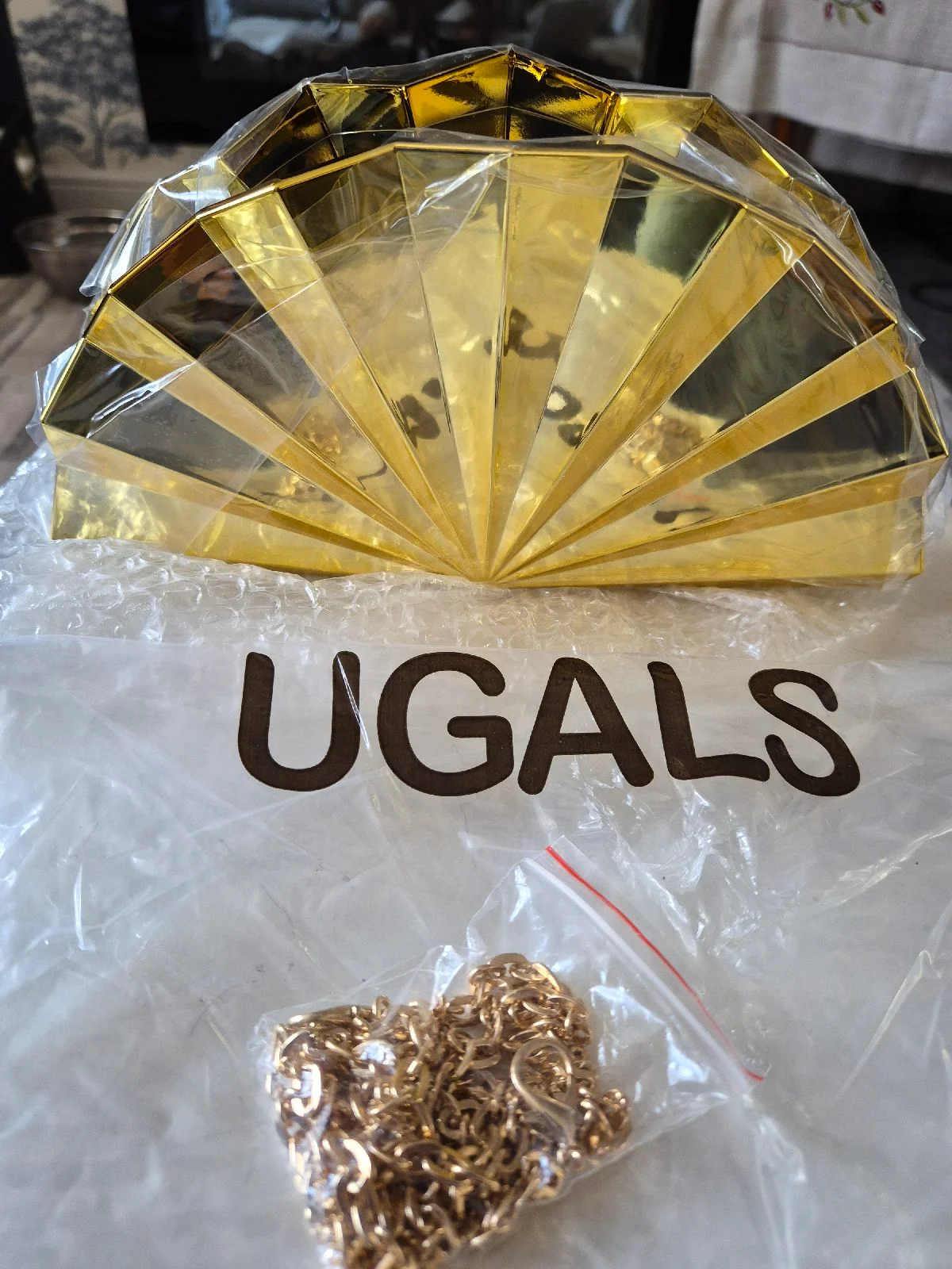 Unusual ladies clutch bag with chain