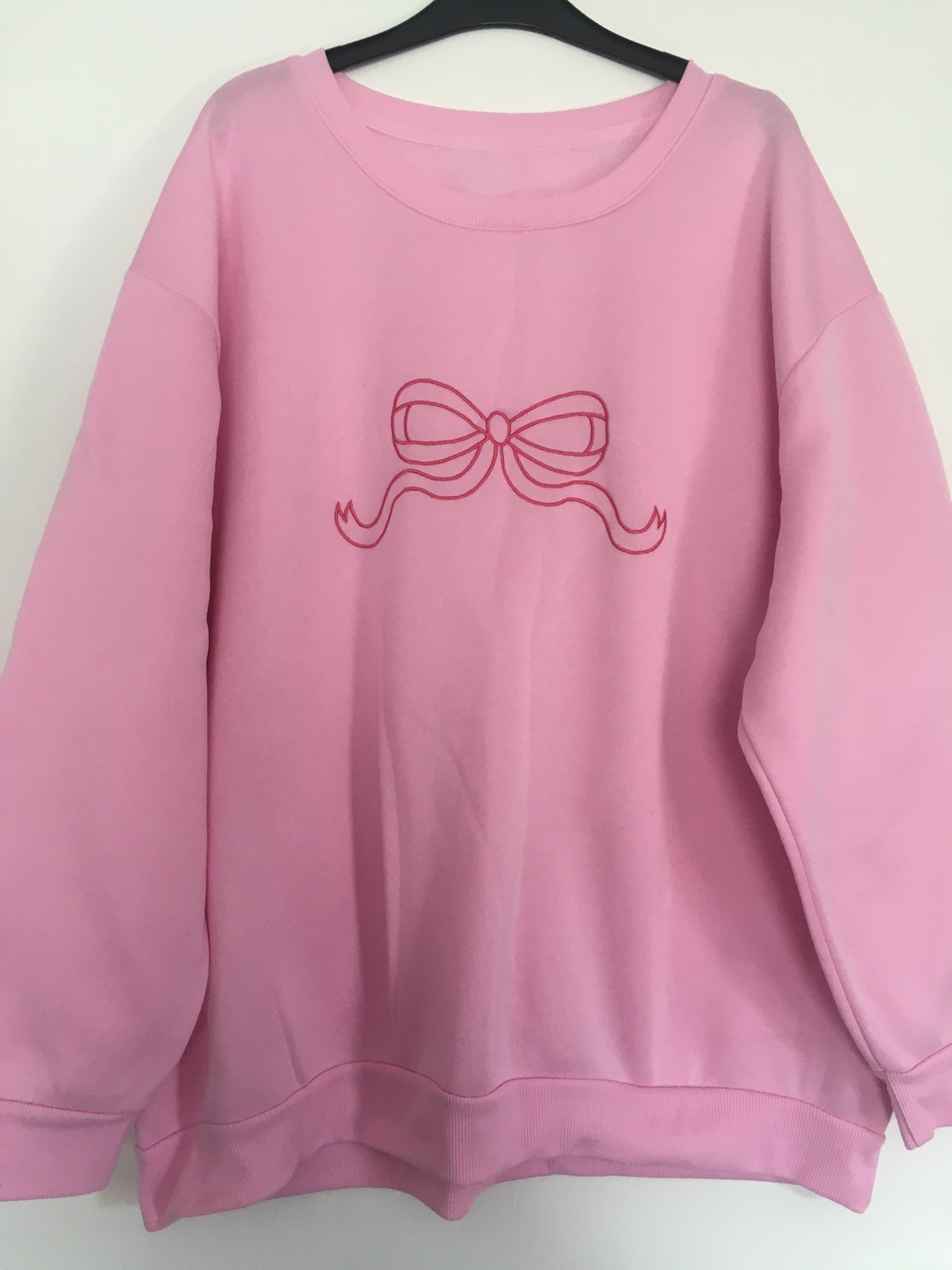 Pink bow jumper