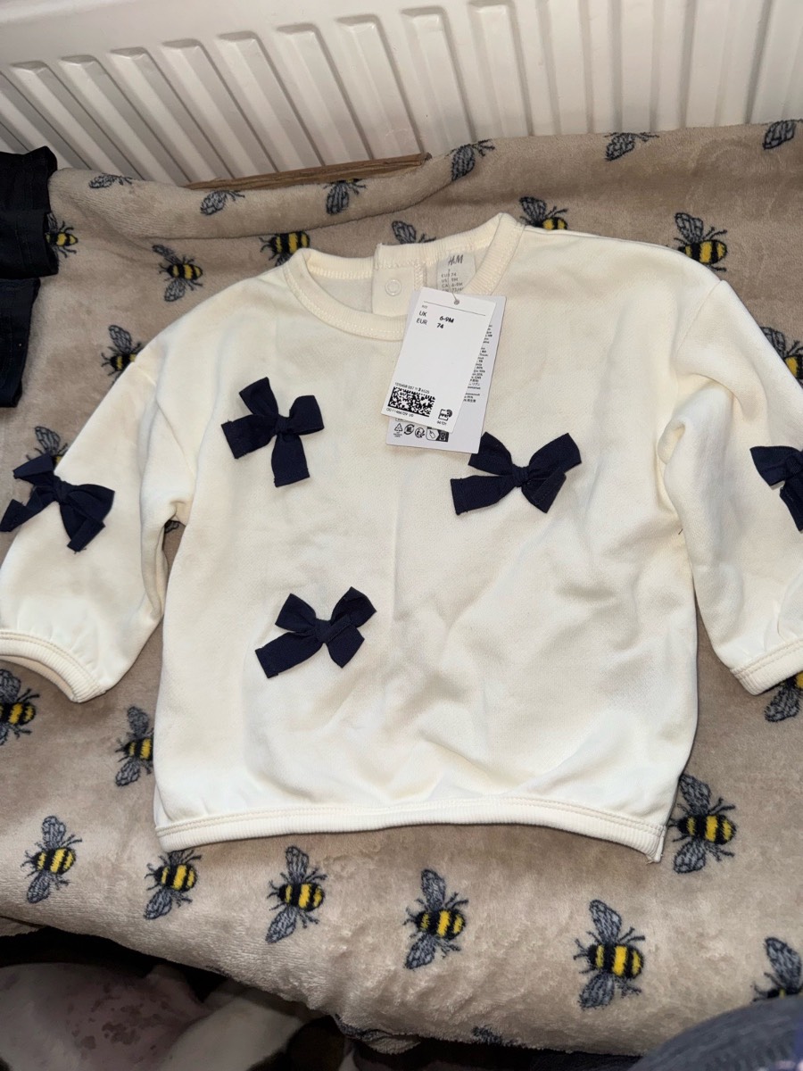 H&M baby girls cream sweater with navy blue bows age 6-9 months