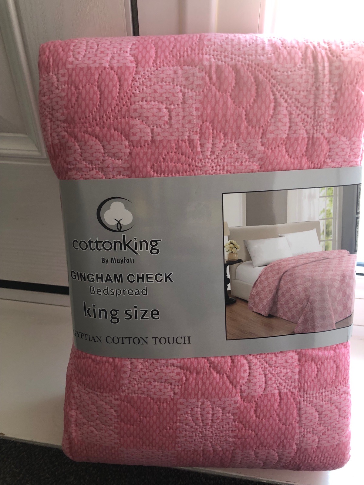 Pink gingham check bedspread.  Kingsize