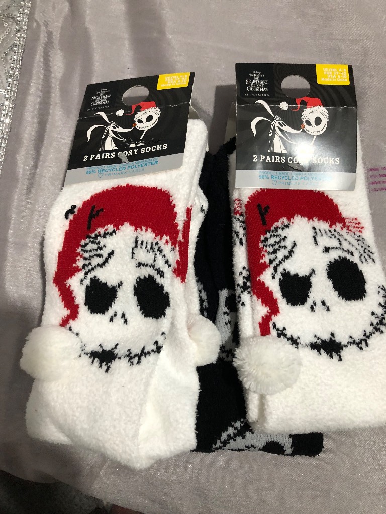 4 pair Christmas bed socks.  One size. New