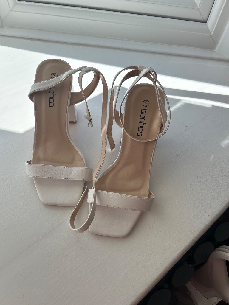 White strappy heals