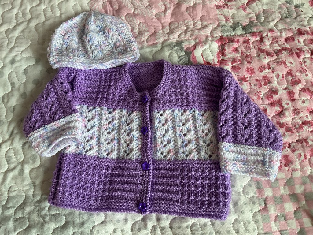 Knitted babies jacket and hat