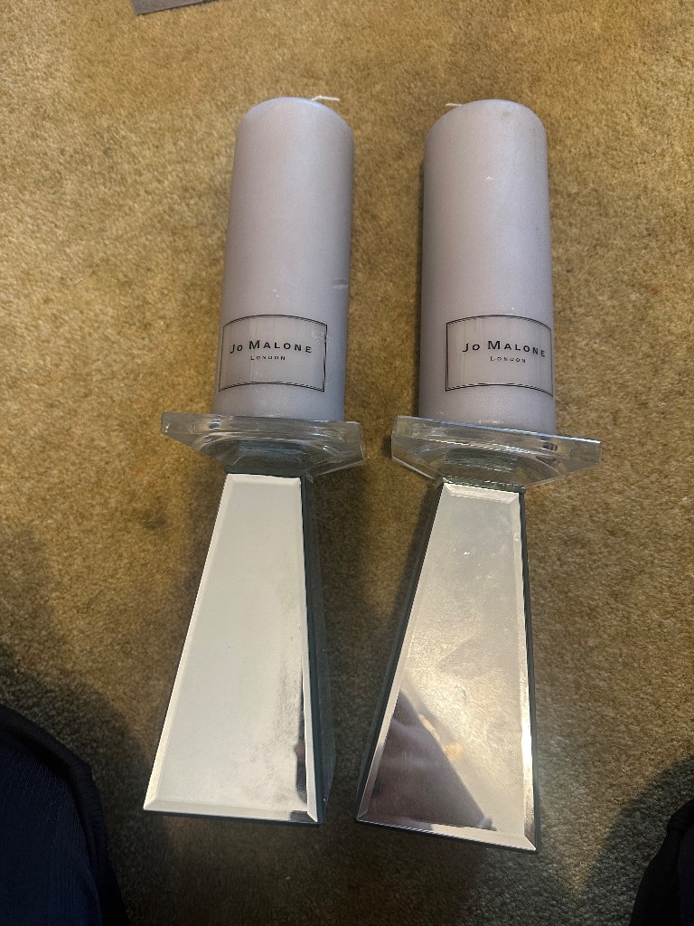Pair of silver candle sticks with candles included