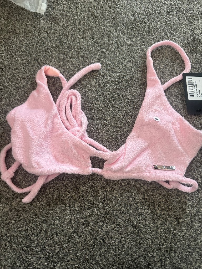 The couture club pink bikini top