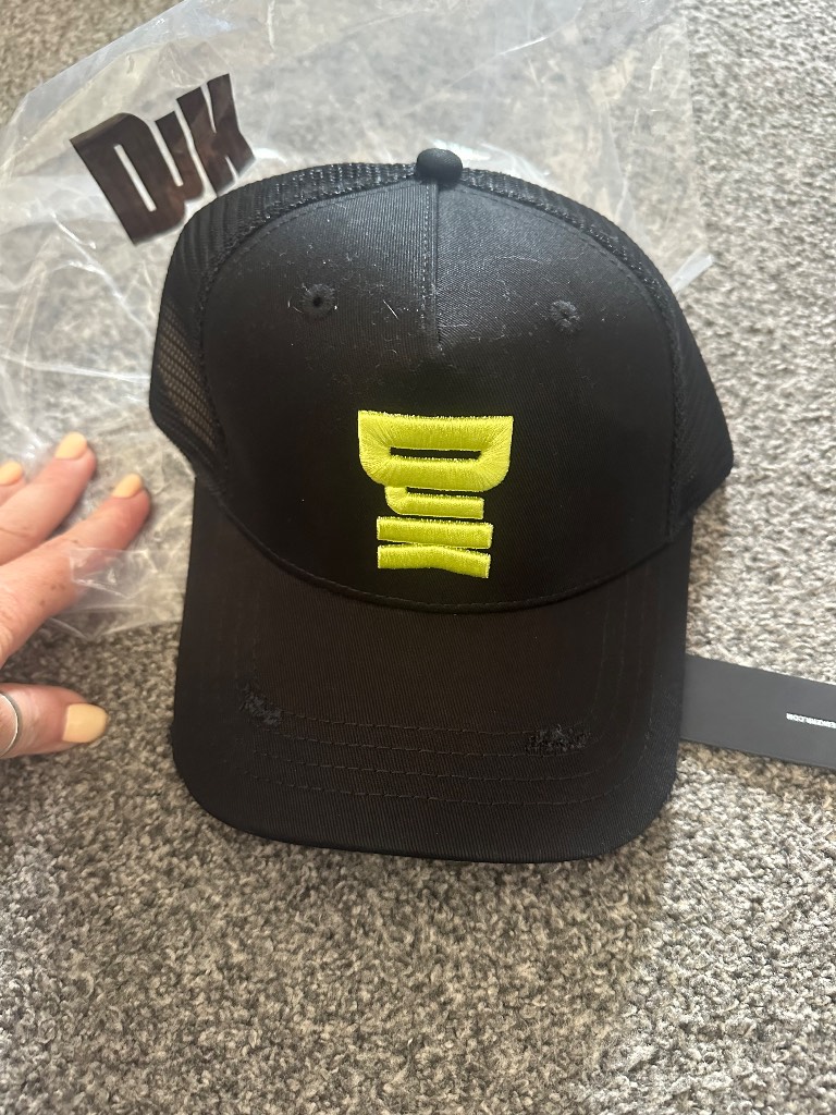 Djk hat with yellow writing