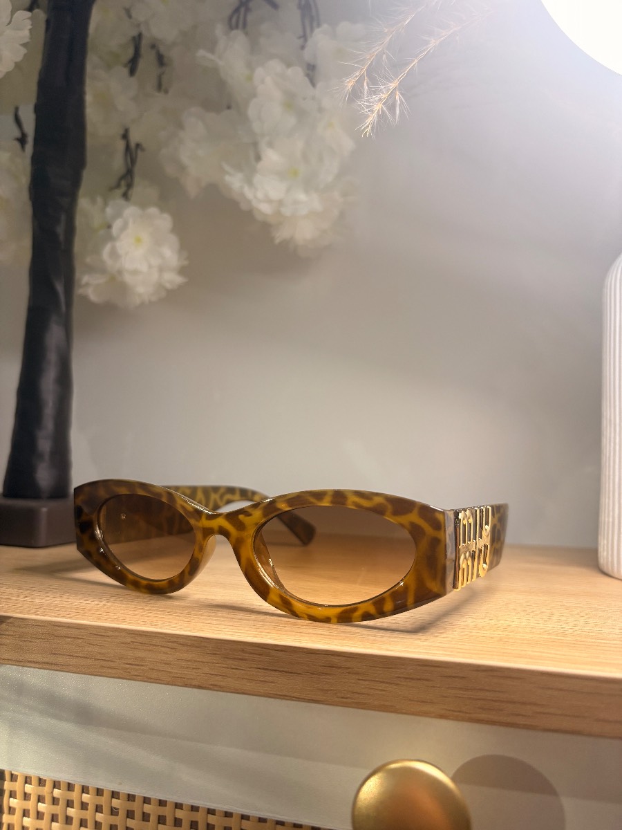 Oval tortoiseshell sunglasses