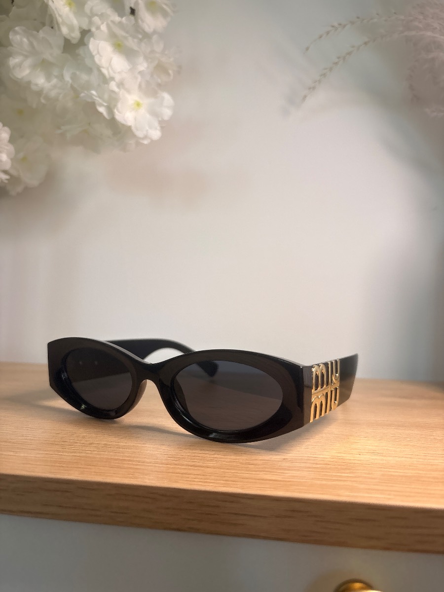 black acetate oval frame sunglasses