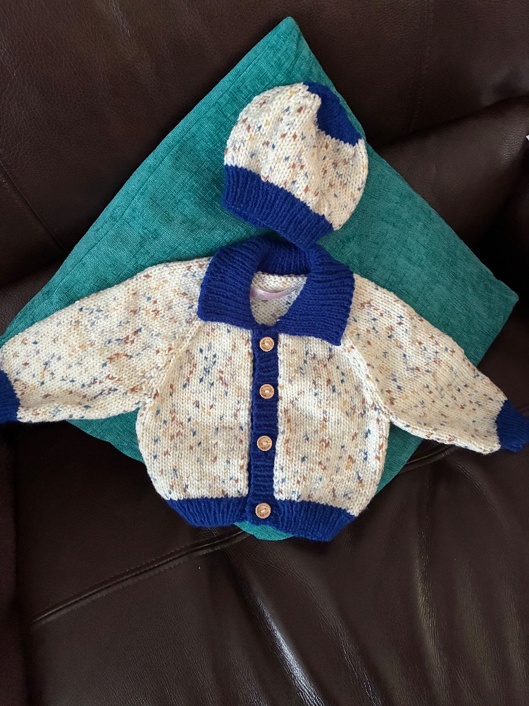 Hand knitted baby’s cardigan