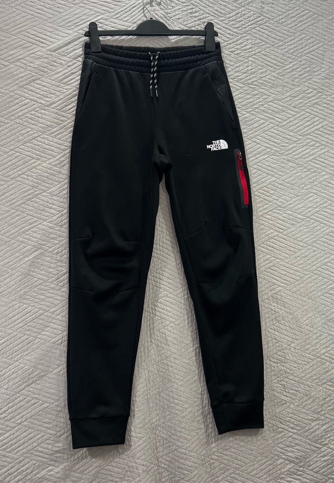 The North Face men’s black 100% polyester activewear joggers pants size UK extra small