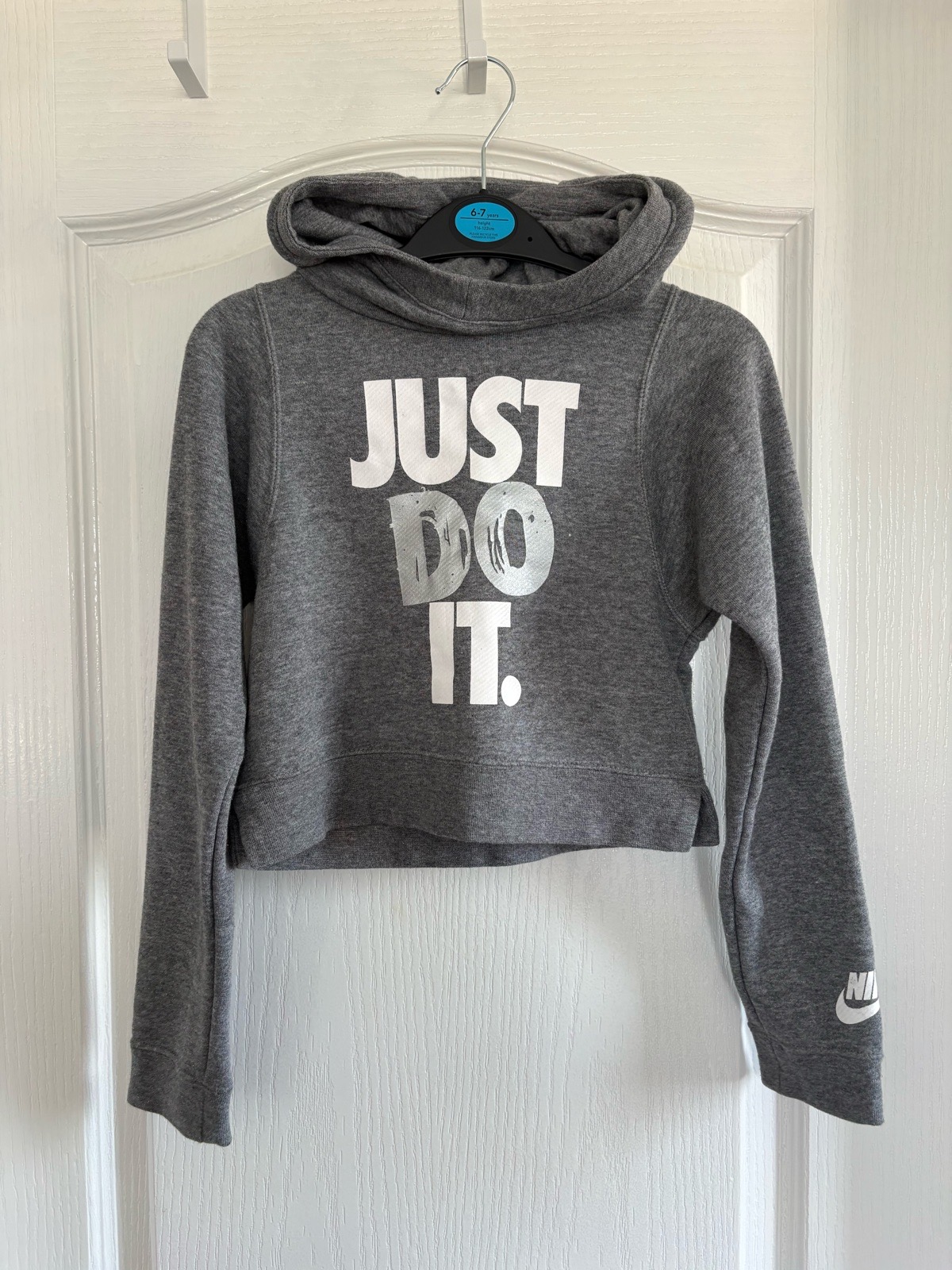 Nike, Just Do It Grey Hoodie/jumper. Small, age 8-10
