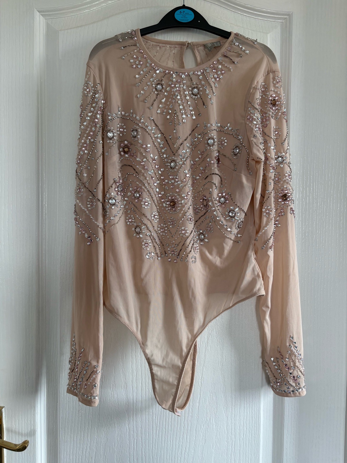 ASOS nude mesh sparkly/embellished, long sleeve body suit. Size 12