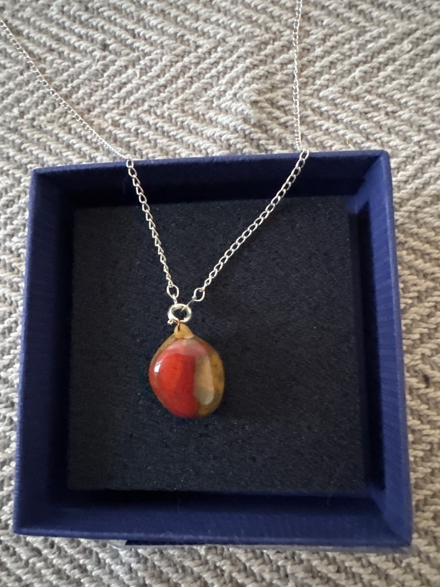 Tiger eye pendant on silver necklace