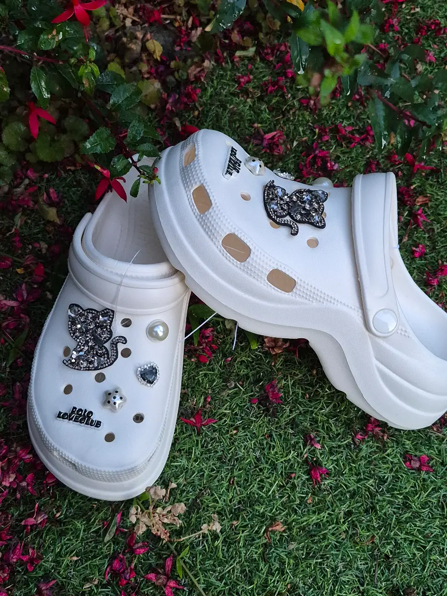 Women’s clogs with sparkling bow.