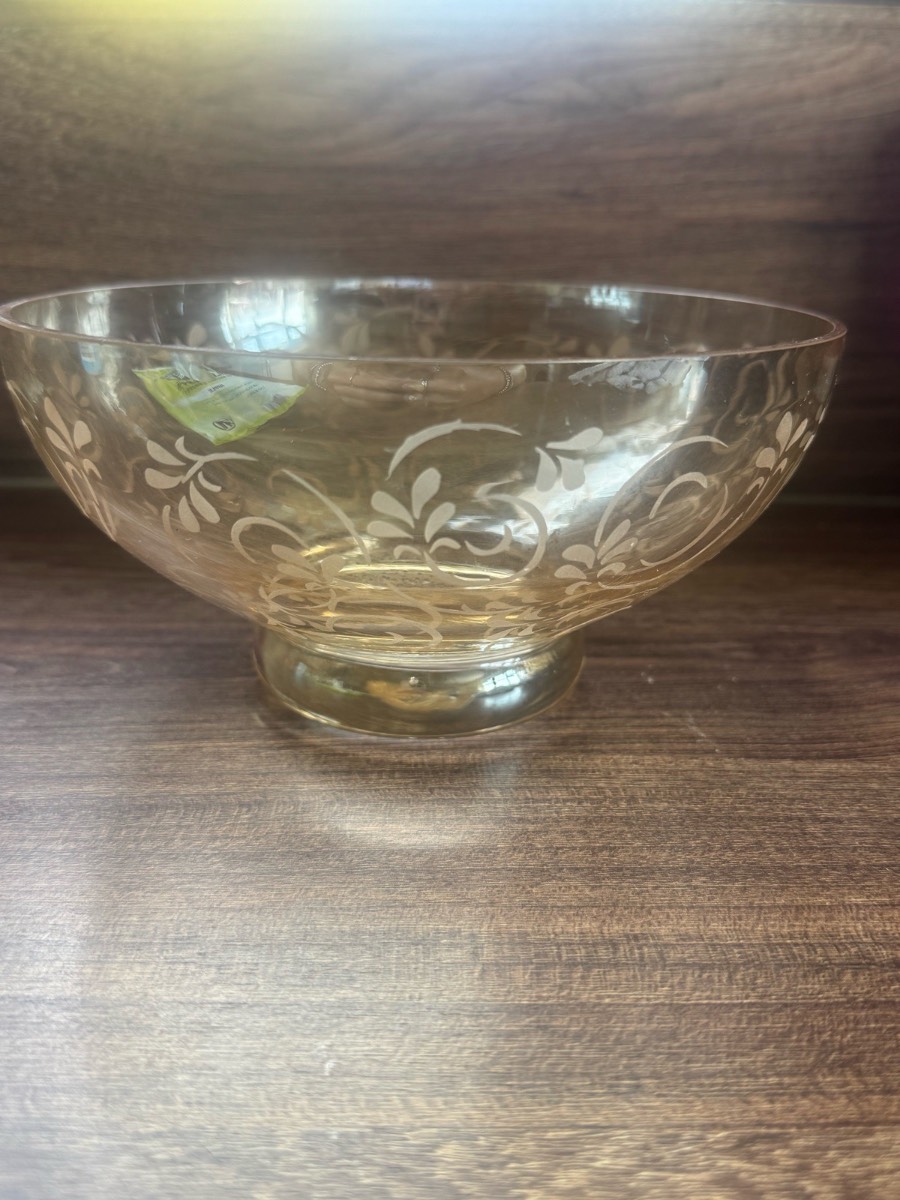Decorative glass bowl with swirl pattern