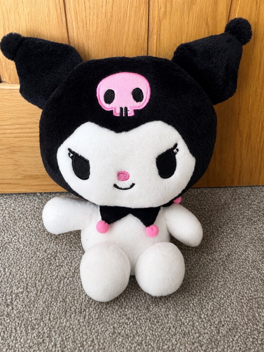 Sanrio Kuromi plush toy, black and white with pink skull on head