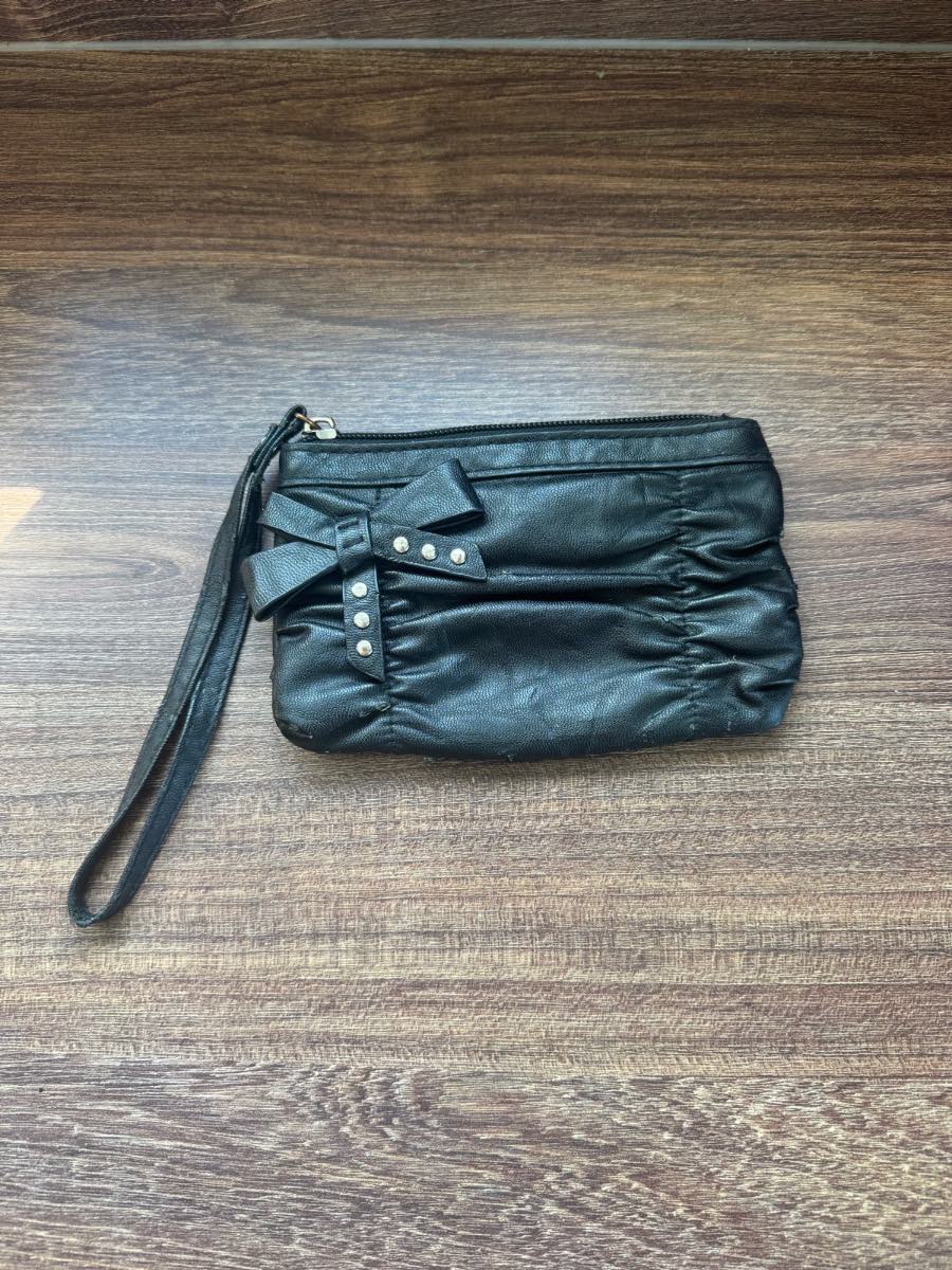 Red Herring black bow wristlet