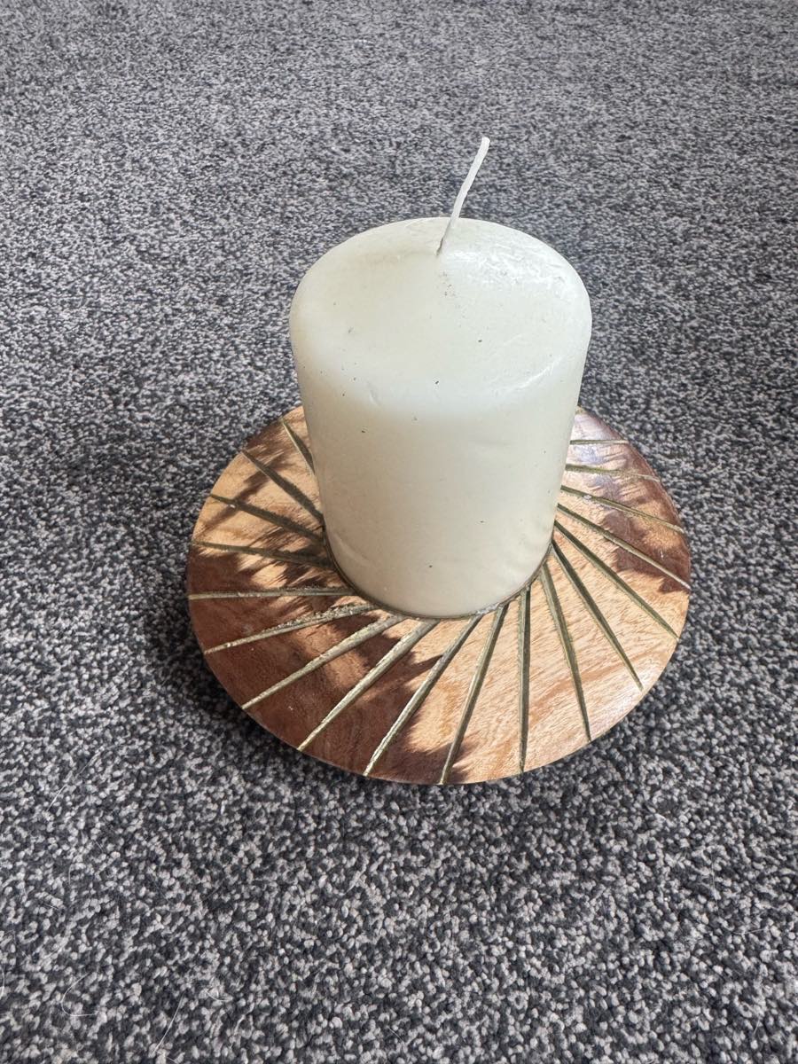 Handmade wooden candle holder with the candle