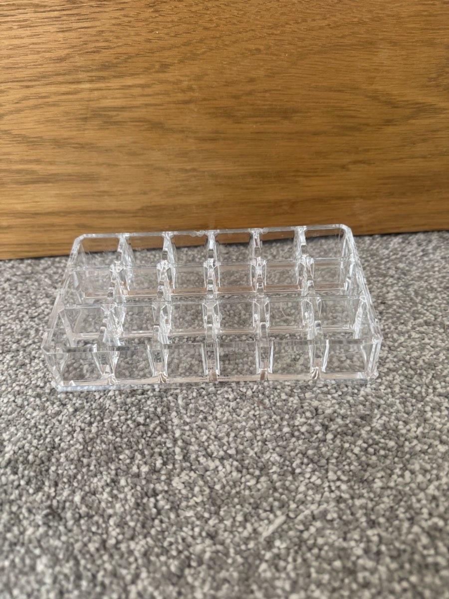 Clear acrylic lipstick organizer with 18 compartments