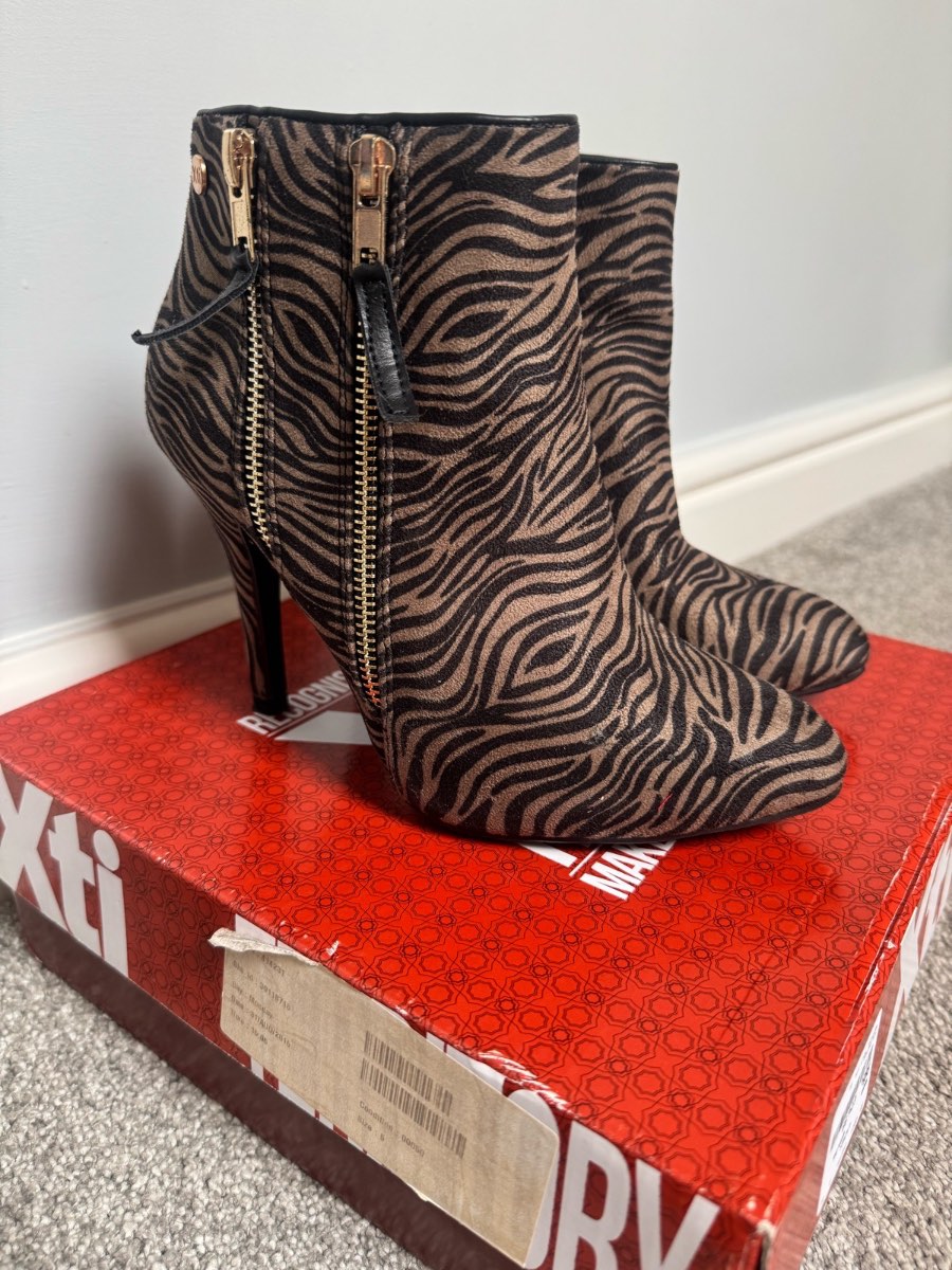 XTI black and brown zebra print ankle boots