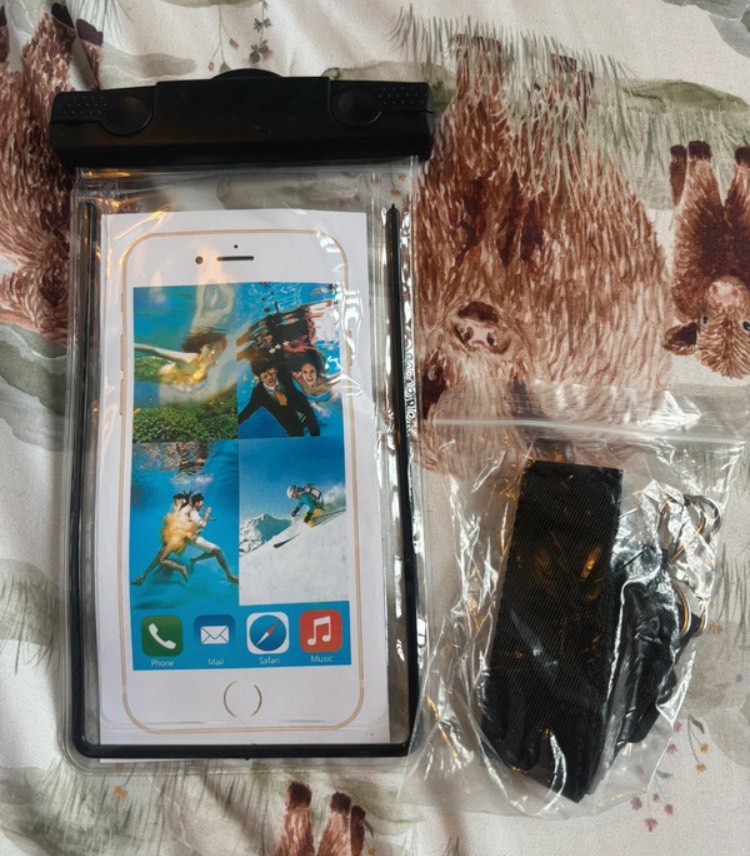 Black in colour waterproof phone case with strap
