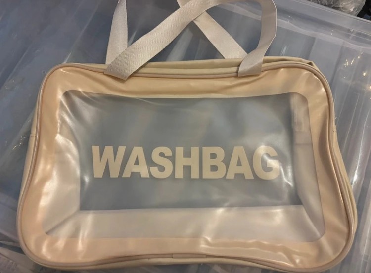 Beige toilletry bag