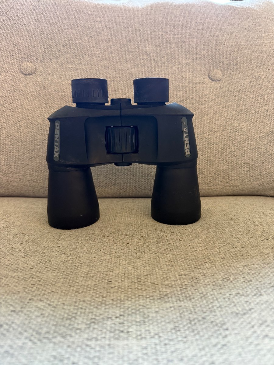 Compact Luxun 10x25 binoculars in very good used condition.  Ideal for:  * Bird watching * Sporting