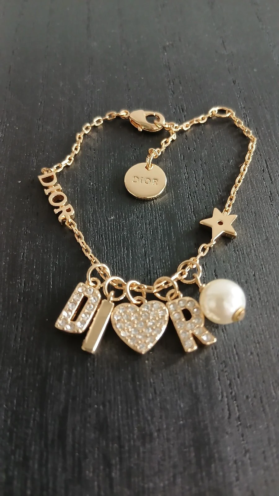 Gold-tone bracelet with charms - Adjustable length