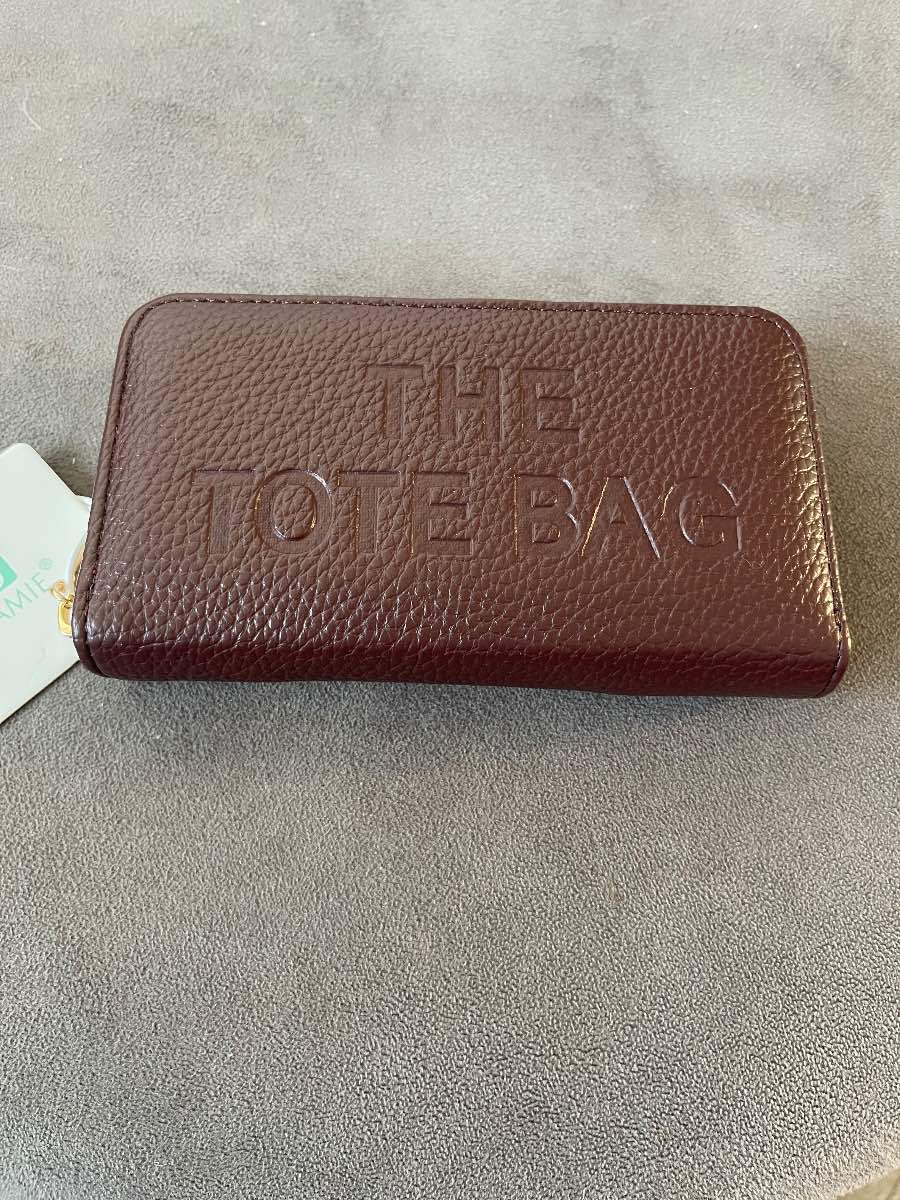 Chocolate coloured textured faux leather purse features