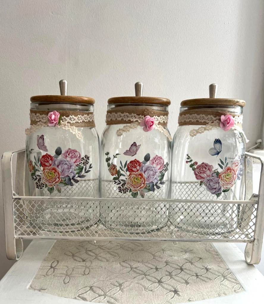 Set of Three Decorative Glass Jars Floral Decals Wooden Lids and Metal Rack