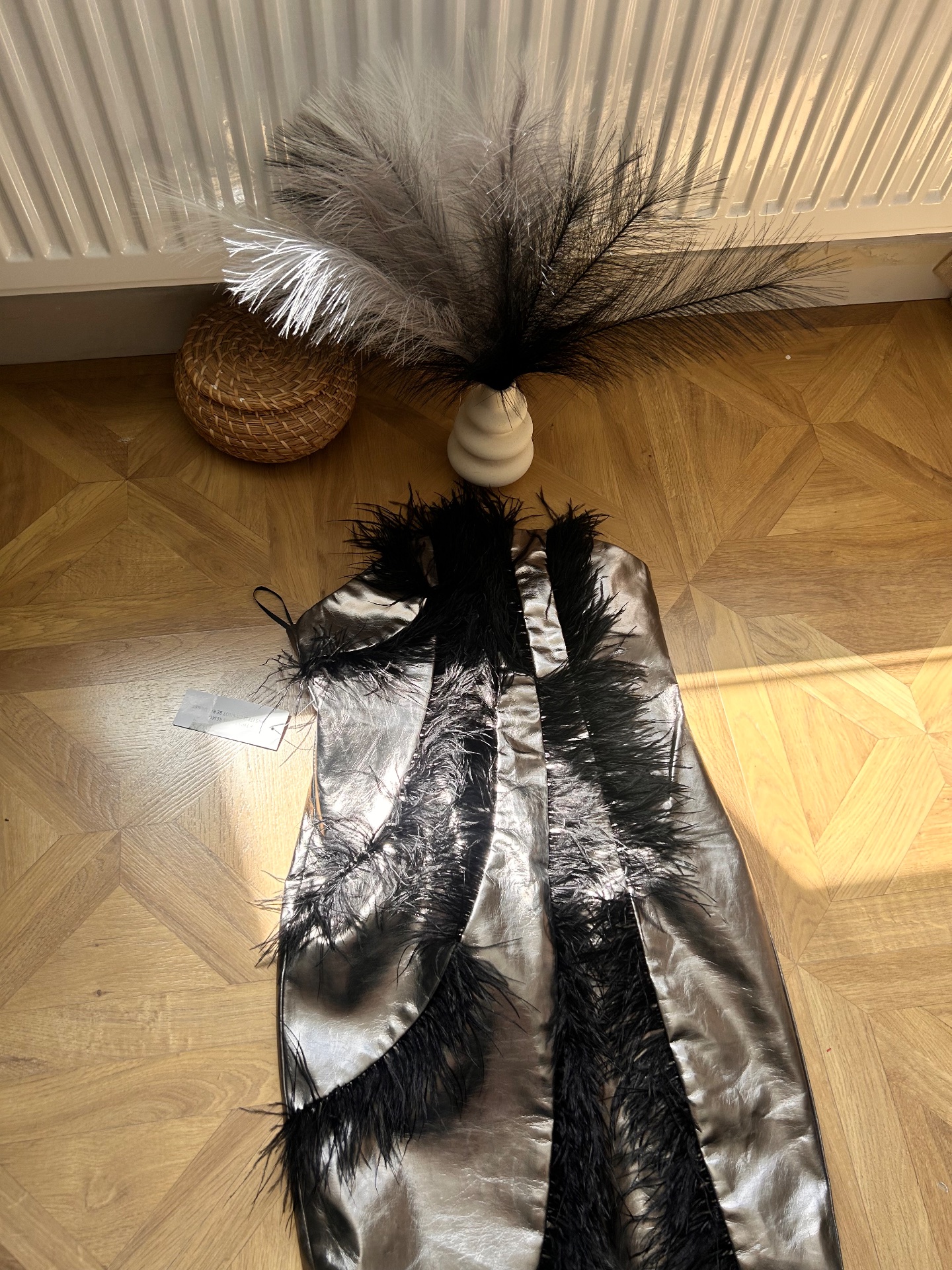 Amy Lynn Metallic Grey With black feathers size L New with tags dress
